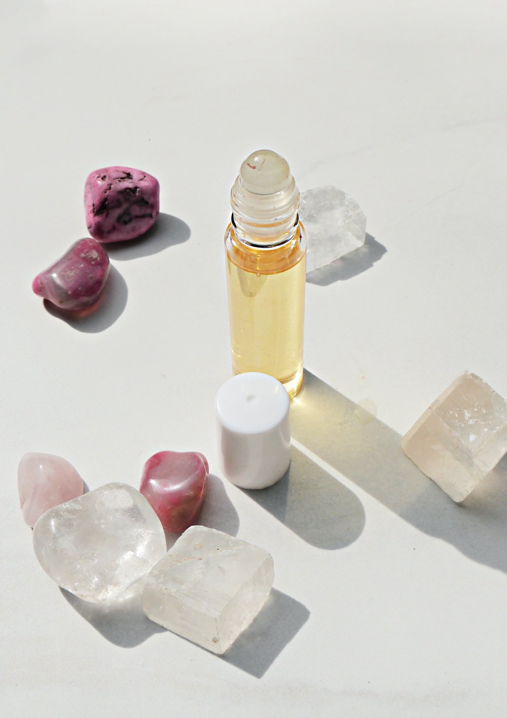Lip Oil in Roller Ball Bottle with pink stones