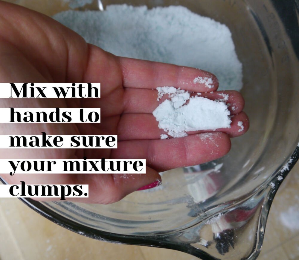 Hand clumping white powder